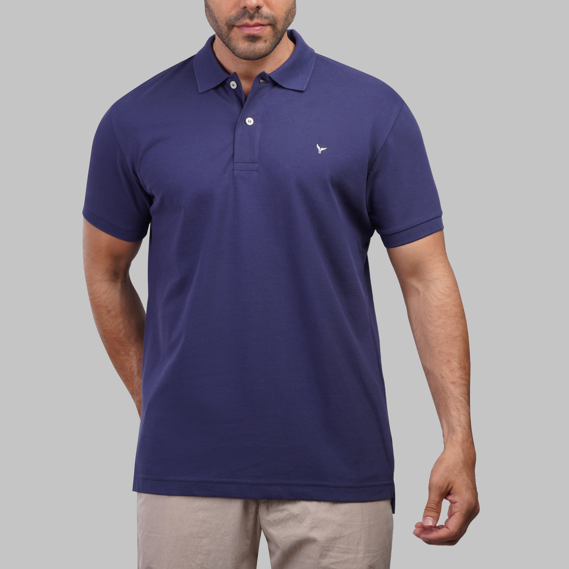 Shop classic fit pique indigo polo shirt for men summer 2026 by Dockland - تسوق قميص بولو بيكيه رجالي كلاسيك انديجو ازرق نيلي صيفي 2026 من دوكلاند - ملابس رجالي كاجوال صيفي